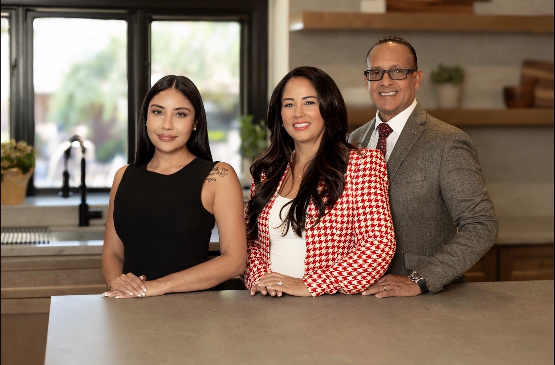 Angelina Garcia, Britney Gaitan and Rey Gaitan of the Gaitan Group